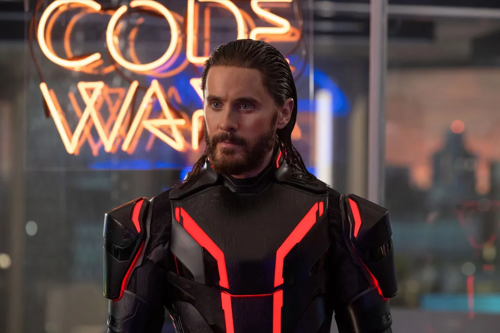 Jared Leto as Ares in "Tron: Ares," wearing a black and red glowing suit.