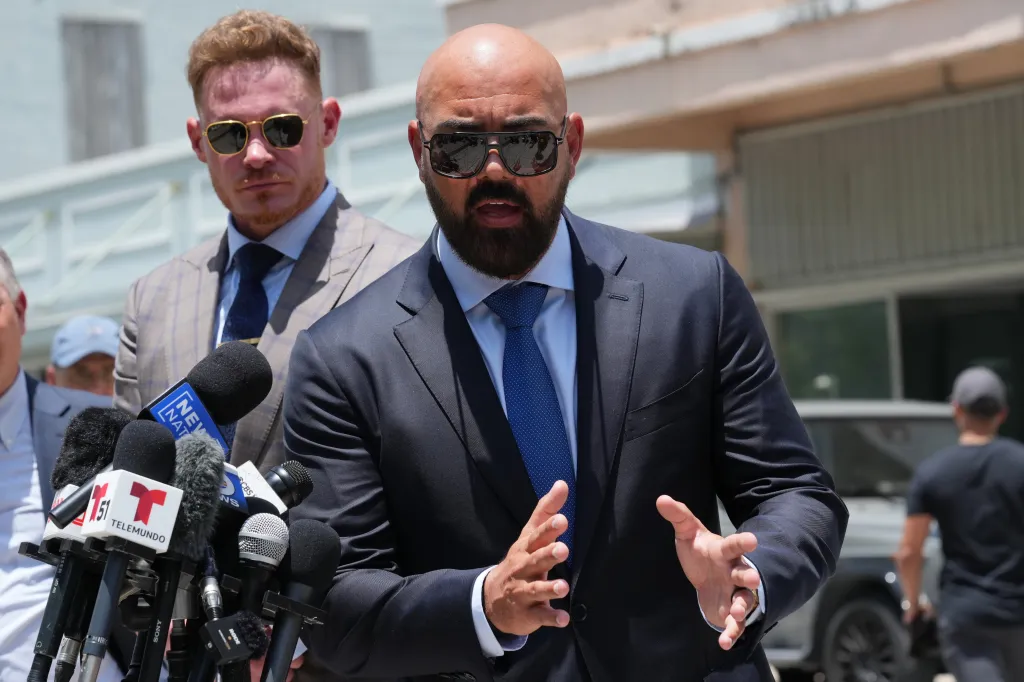 Attorney Joseph McBride speaks to the news media following a court hearing for his clients Andrew and Tristan Tate after they were arrested to face rape and sex trafficking charges against them in the United Kingdom, Monday, July 20, 2026, in Miami.
