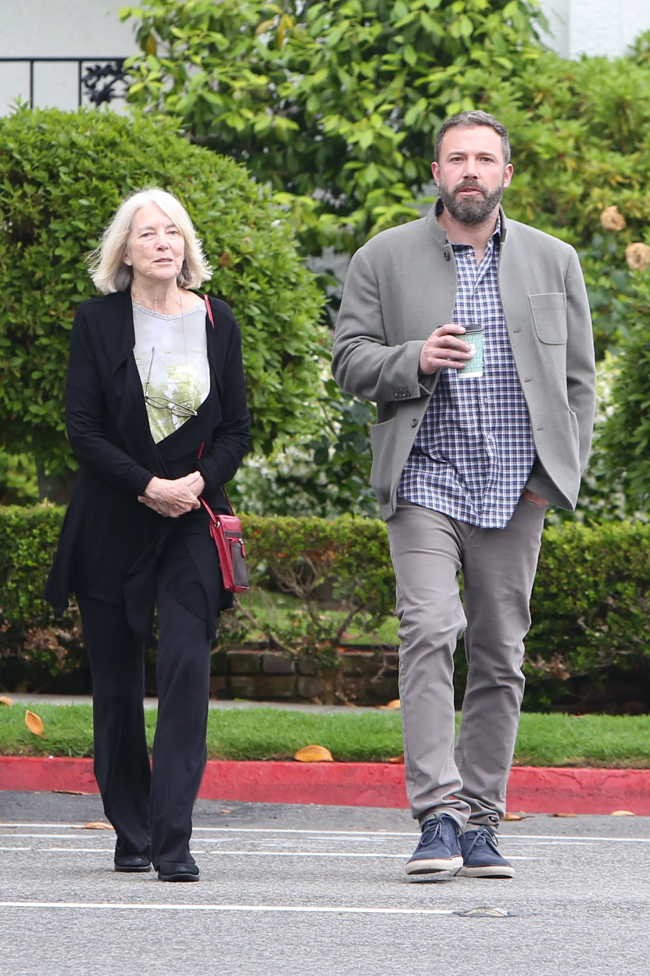 Ben Affleck walking with his mother, Christine Anne Boldt.