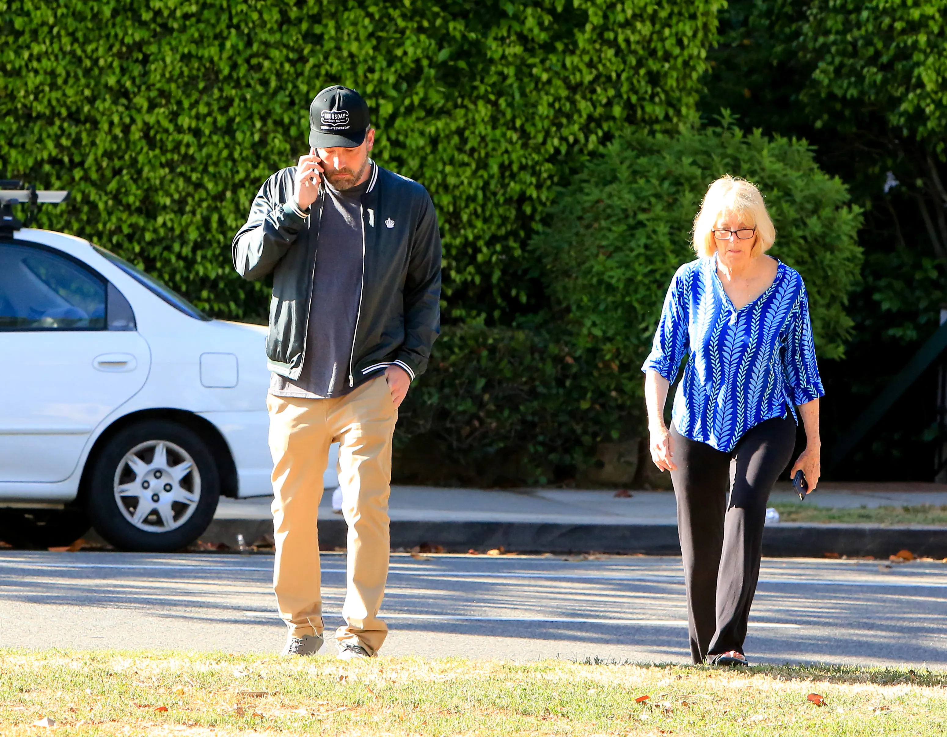 Ben Affleck and his mother, Christine Anne Boldt, walk down the street in Los Angeles.