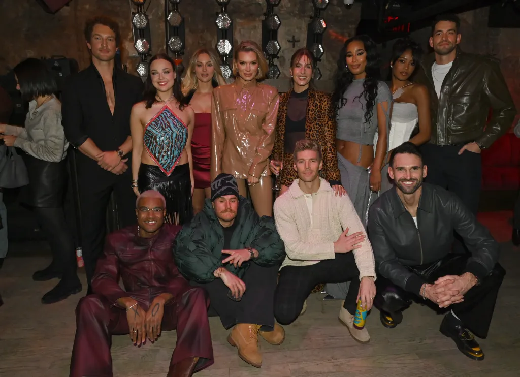 Group photo of Ben Waddell, KJ Dillard, Levi Sebree, Bailey Taylor, West Wilson, Lindsay Hubbard, Amanda Batula, Kyle Cooke, Mia Calabrese, Ciara Miller, Carl Radke, and Jesse Solomon posing at the Summer House Season 10 premiere party.