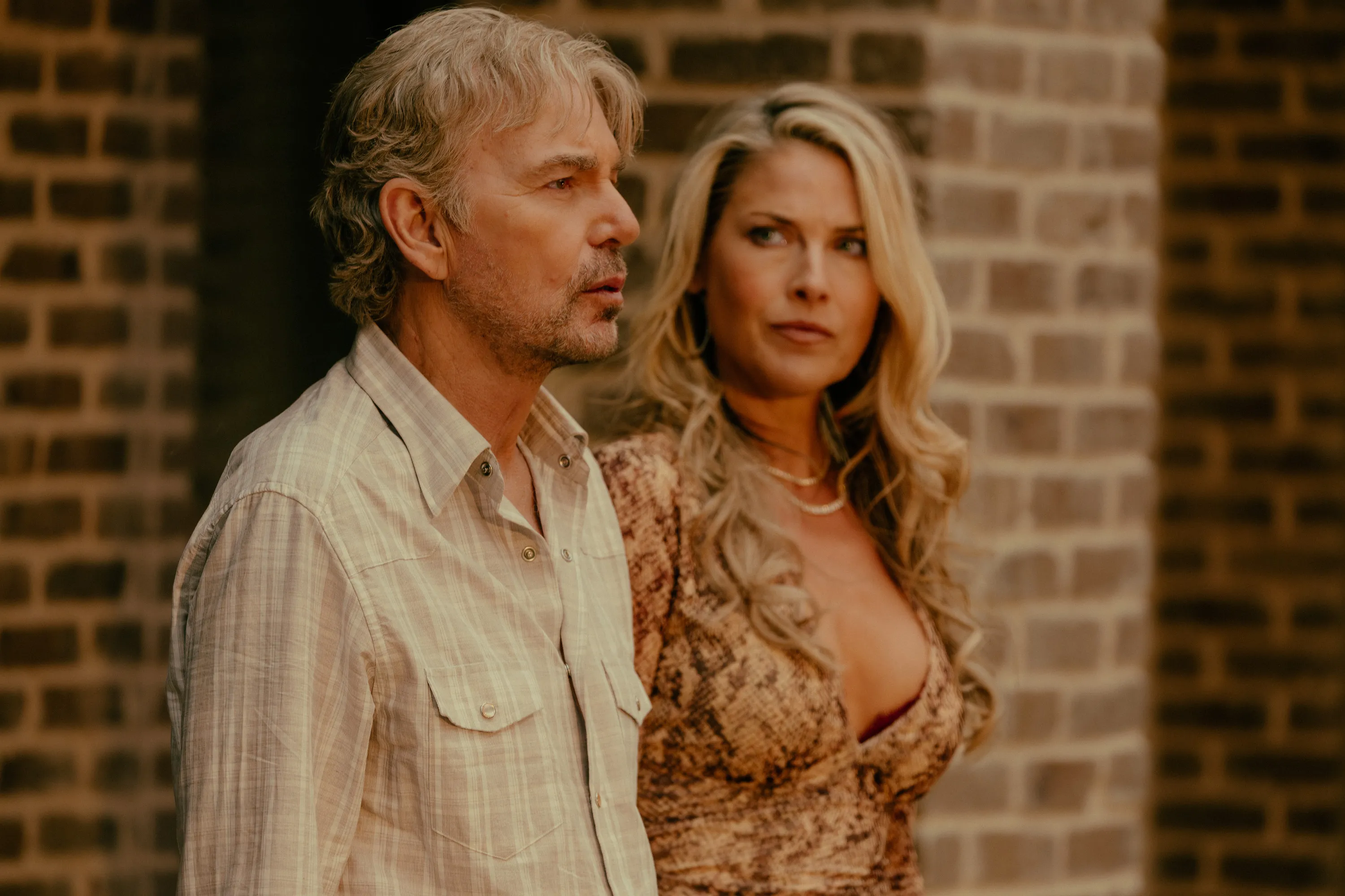 Billy Bob Thornton as Tommy Norris and Ali Larter as Angela Norris in Landman episode 1, season 2.