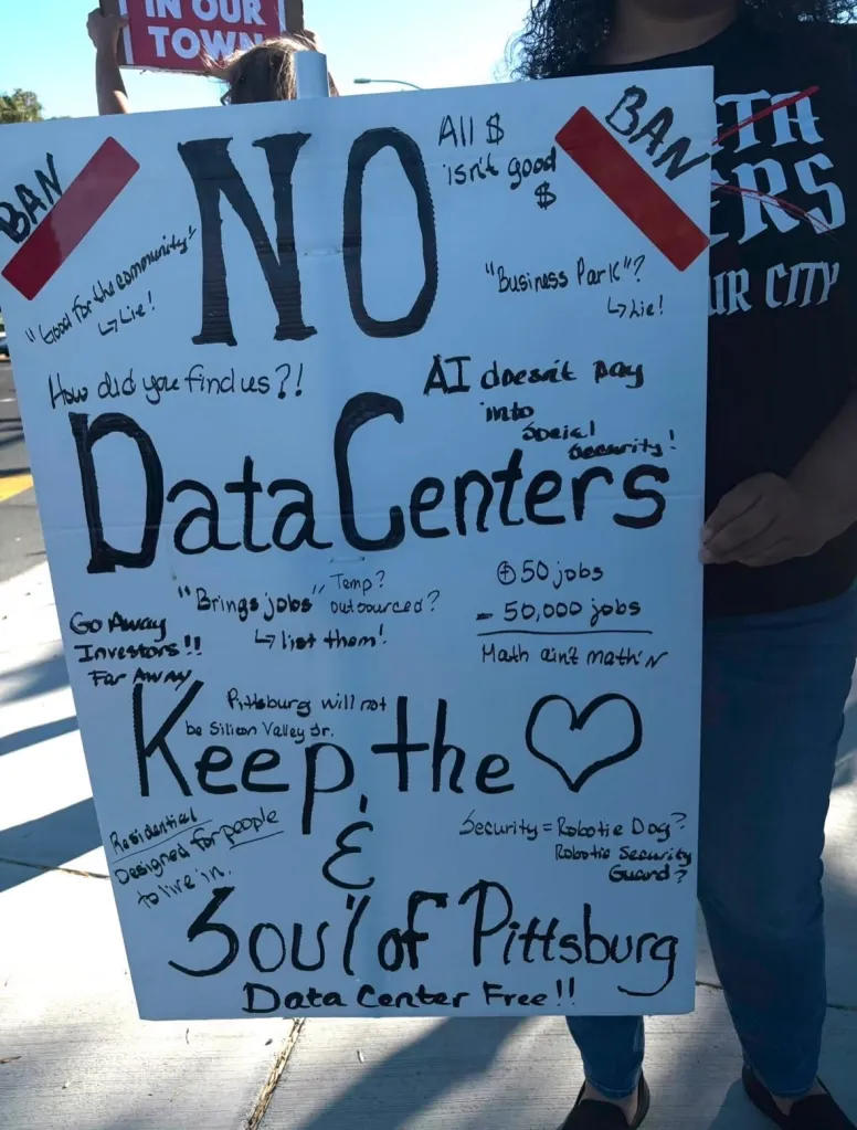 A protest sign reading 