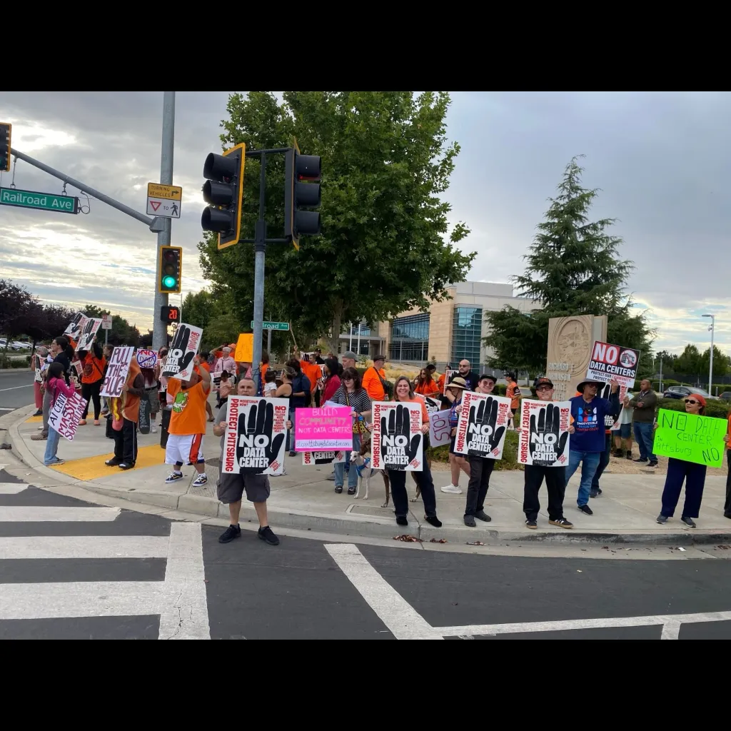 People protesting against an AI data center in Pittsburg.
