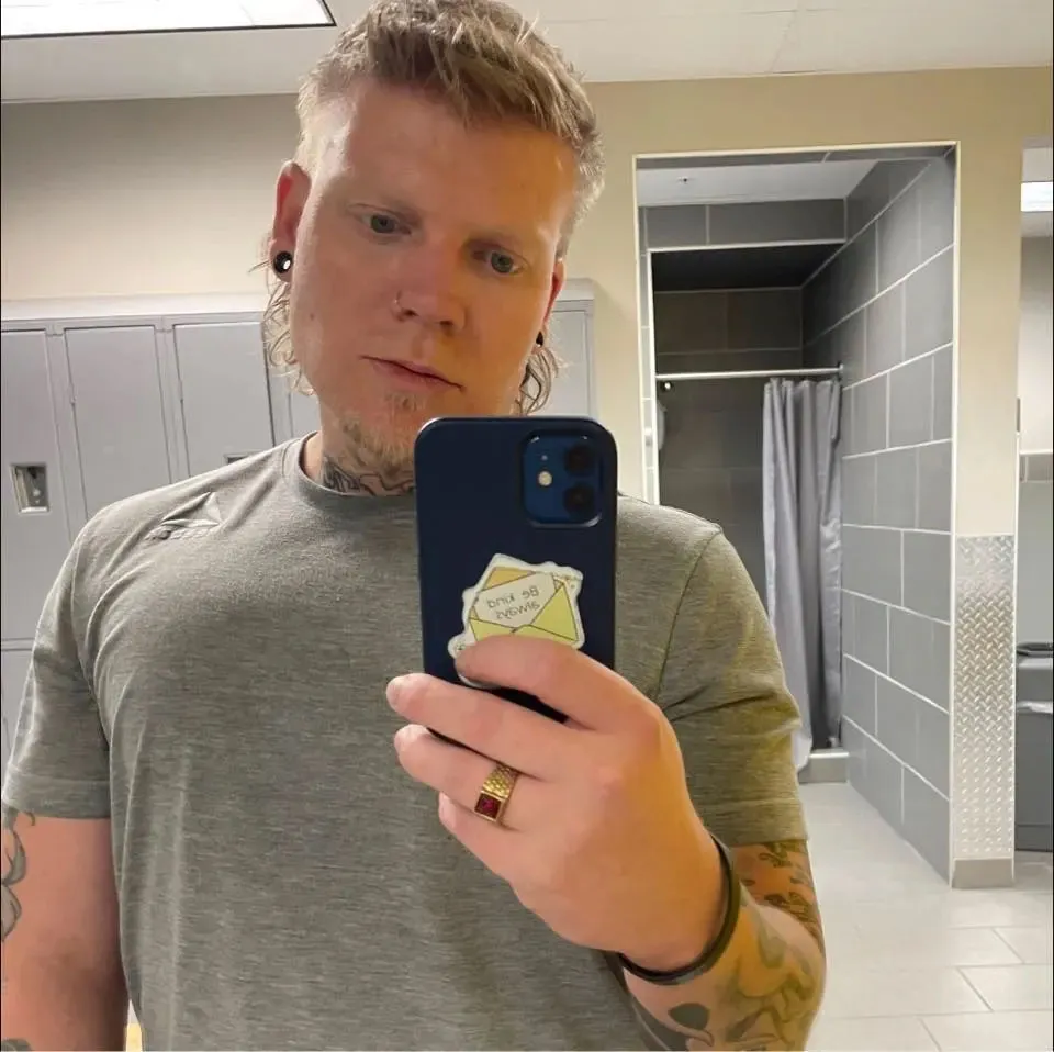 Blake Garrett taking a mirror selfie.