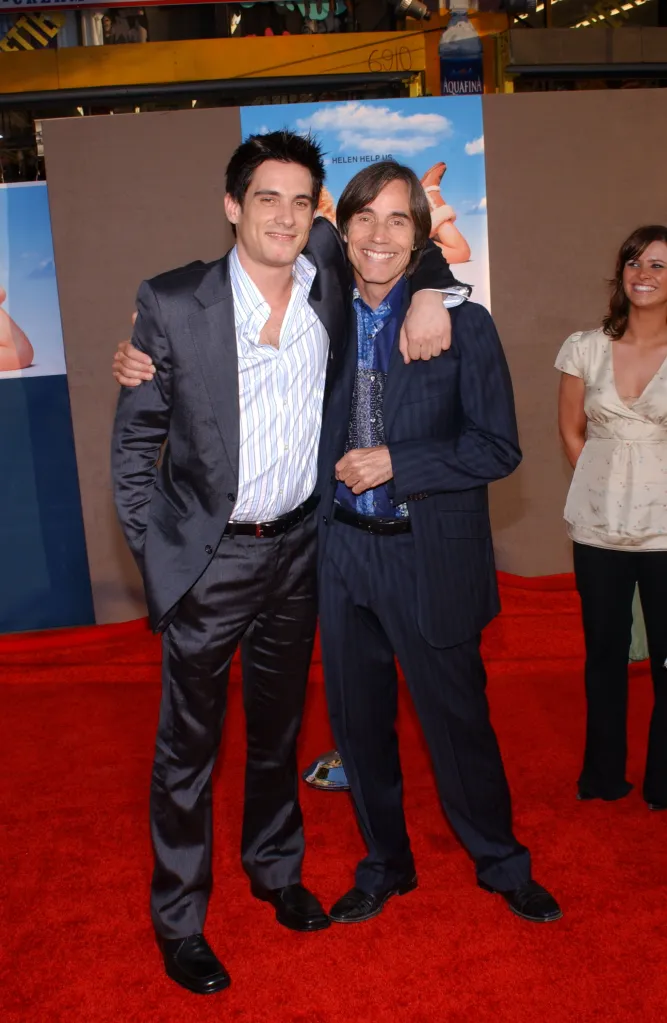 Ethan and Jackson Browne pose with arms around each other at the "Raising Helen" film premiere.