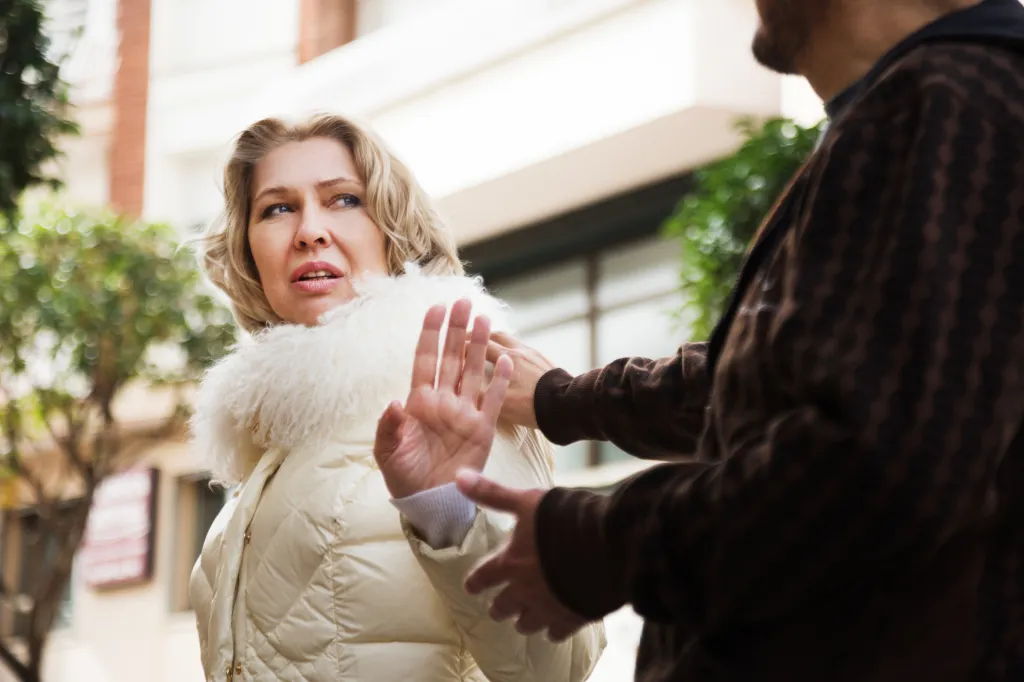 Woman rejecting a man on the street.