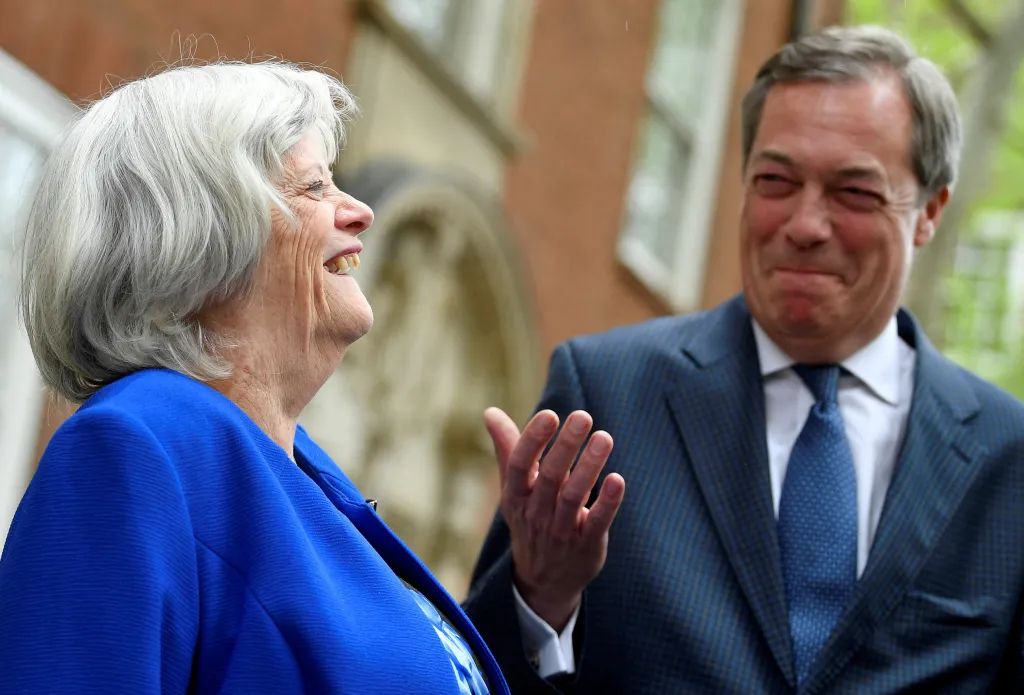 Nigel Farage and Anne Widdecombe pose for a photocall to promote her joining the Brexit Party.