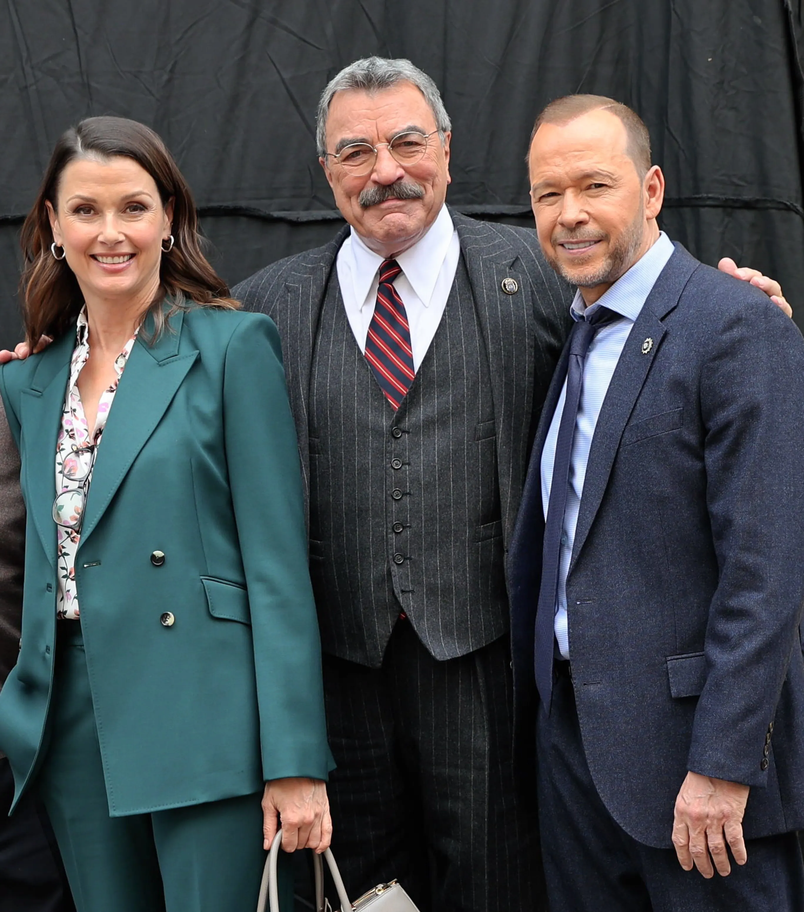 Bridget Moynahan, Tom Selleck, and Donnie Wahlberg from the TV series 'Blue Bloods.'