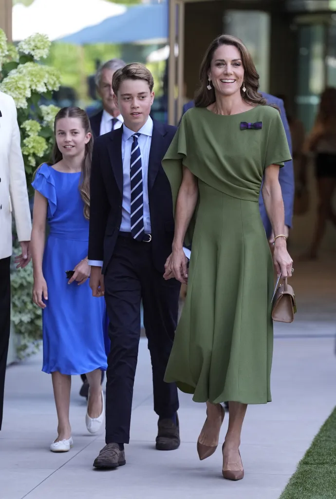 Catherine, Princess of Wales, Prince George of Wales, and Princess Charlotte of Wales arrive at the men's singles final at Wimbledon.