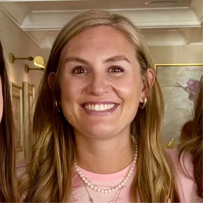 Brooke Hanlon, a psychotherapist, smiling at the camera.
