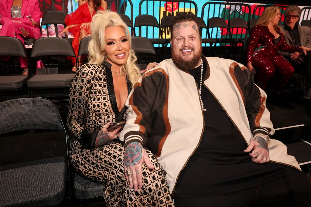 Bunnie XO and Jelly Roll seated together at the 2024 CMT Music Awards.