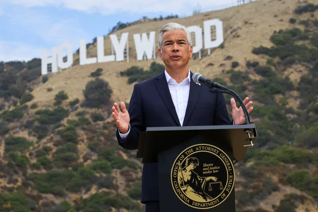 California Attorney General Rob Bonta holds a press conference next to the Hollywood sign.