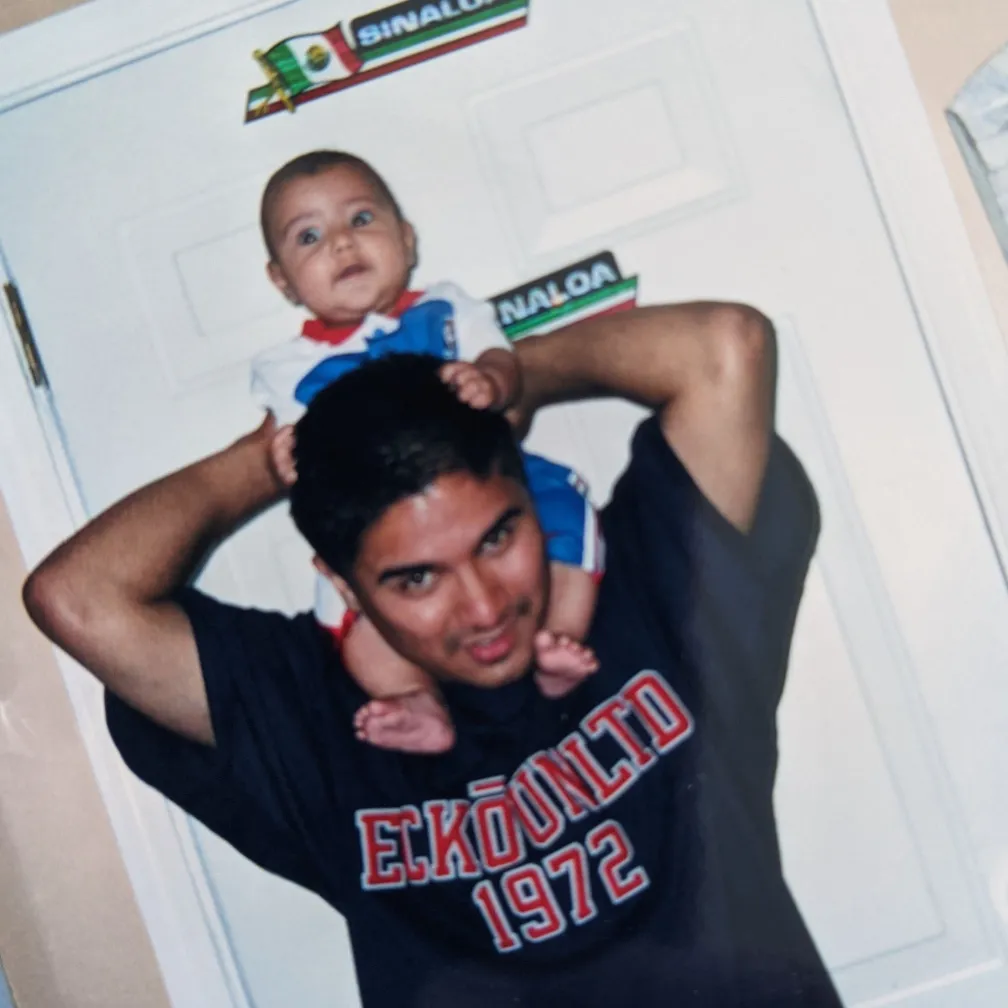 Javier Becerril with his baby son.