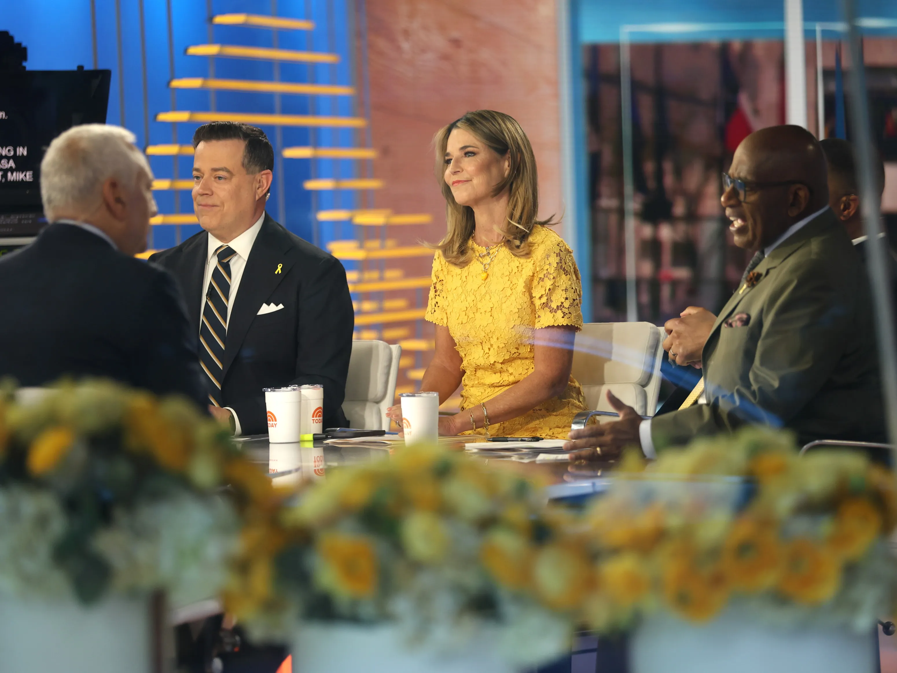 Carson Daly, Savannah Guthrie, and Al Roker on the "TODAY" show set.