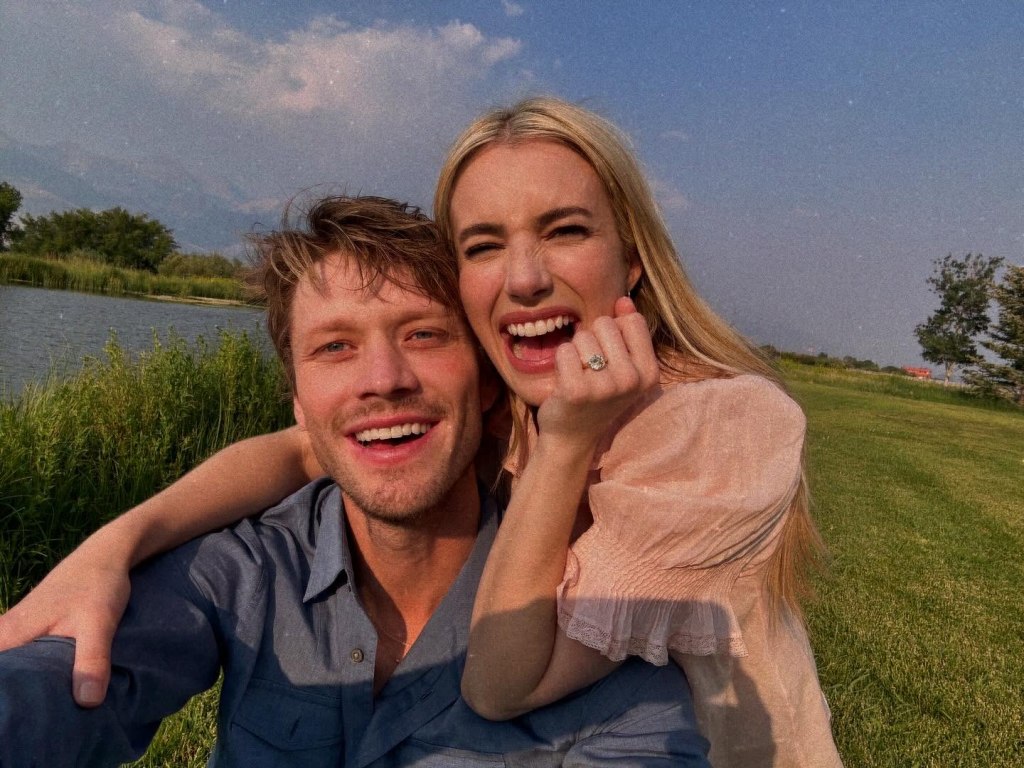 Emma Roberts and Cody John celebrating their engagement, showing off her ring.