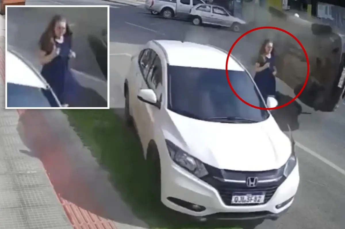 Terrifying video shows woman narrowly escape death as speeding truck plows into SUV next to her