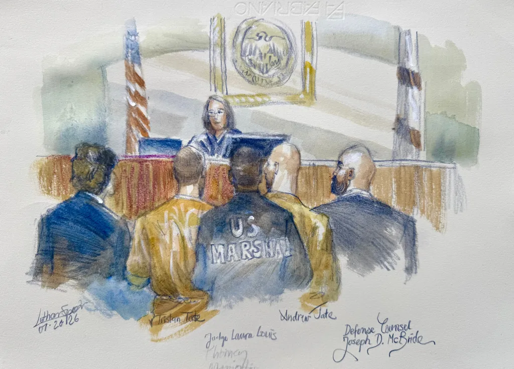In this courtroom sketch Andrew and Tristan Tate appear with their attorneys before judge Lauren Louis in Miami federal court, Monday, July 20, 2026, in Miami.