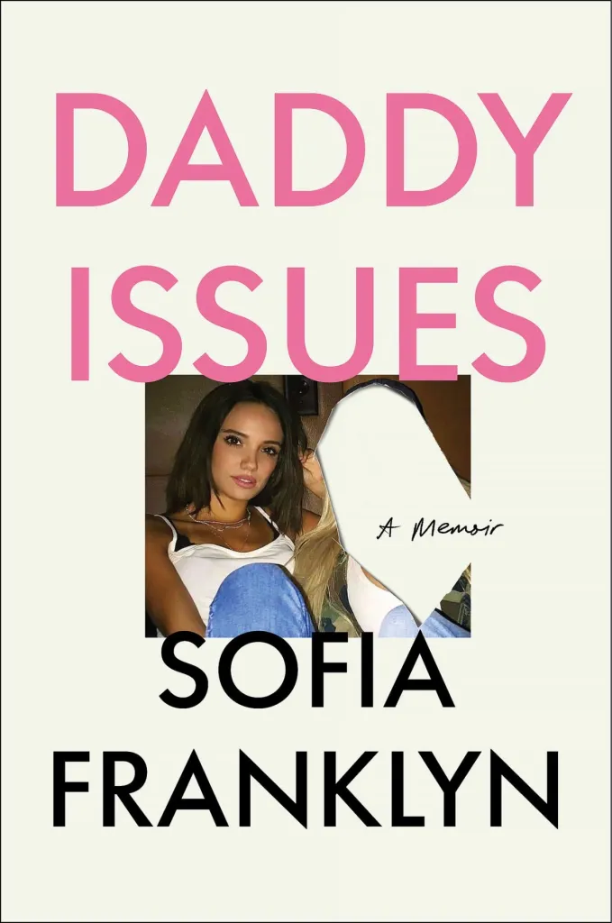 The cover of "Daddy Issues" by Sofia Franklyn, with text that reads "Daddy Issues" in pink, a cutout photo of Sofia Franklyn, and "Sofia Franklyn" in black text below.