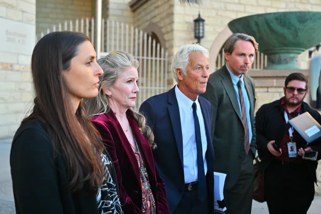 Defense attorney Amber Fayerberg, Melissa Gilbert, attorney Larry Stein, and defense attorney Christopher Allen Dodd address the media.
