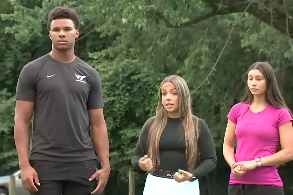 Three people, two women and a man, standing outside.