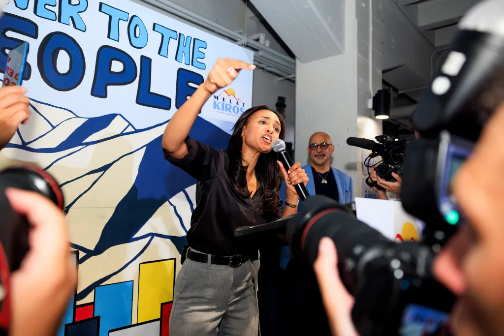 Democratic congressional candidate Melat Kiros speaks to supporters at an election-night watch party.