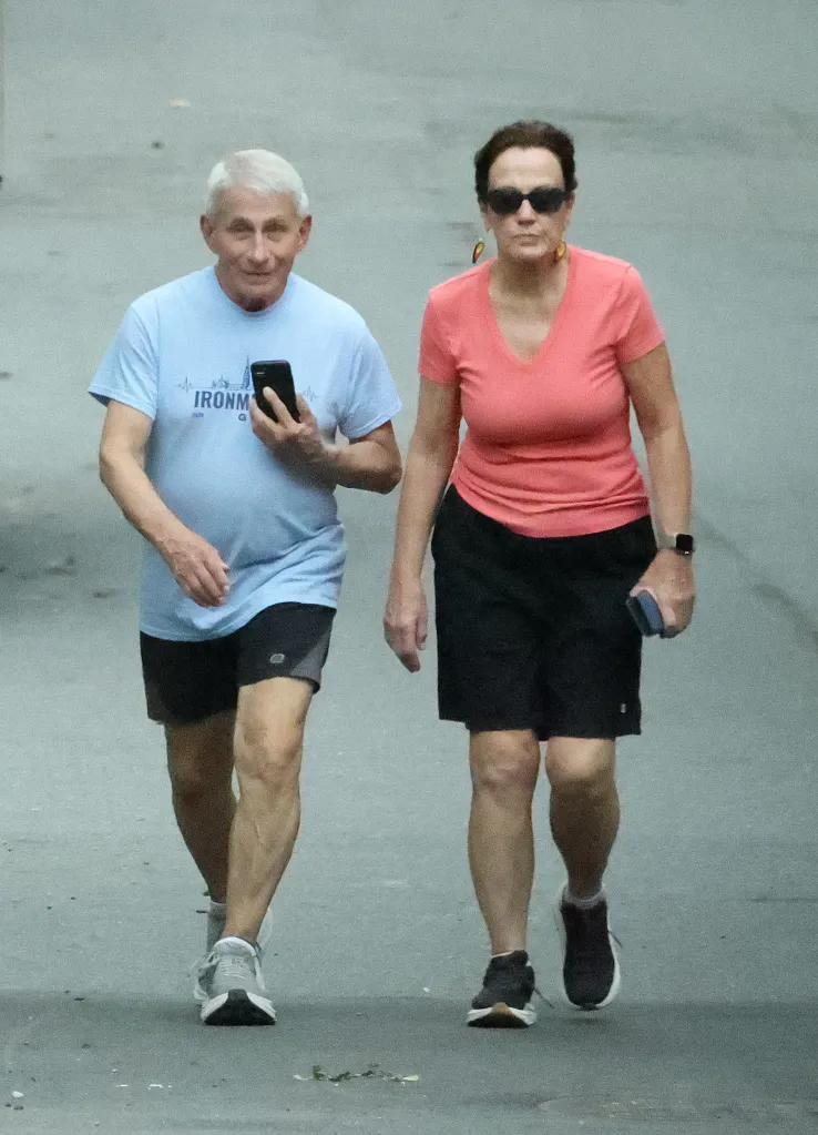 Dr. Anthony Fauci walks with his wife Christine Grady around their neighborhood after his Senate hearing on July 29, 2026.