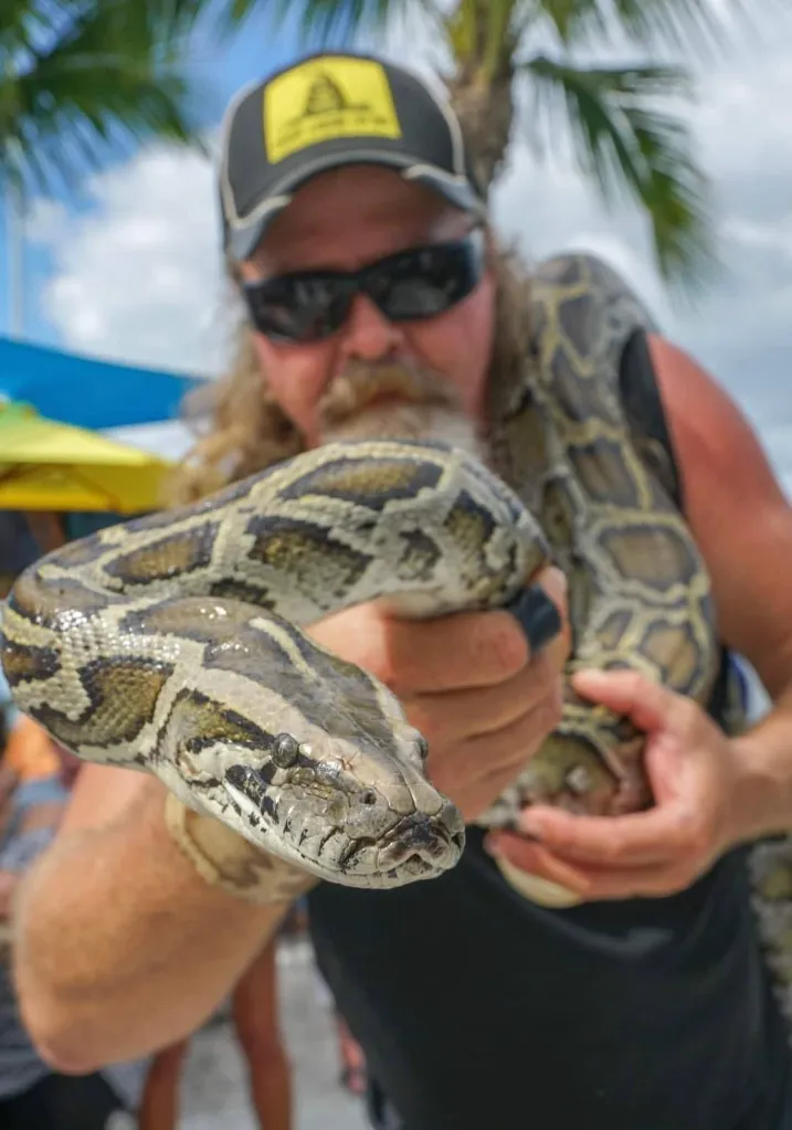 Man with a snake.