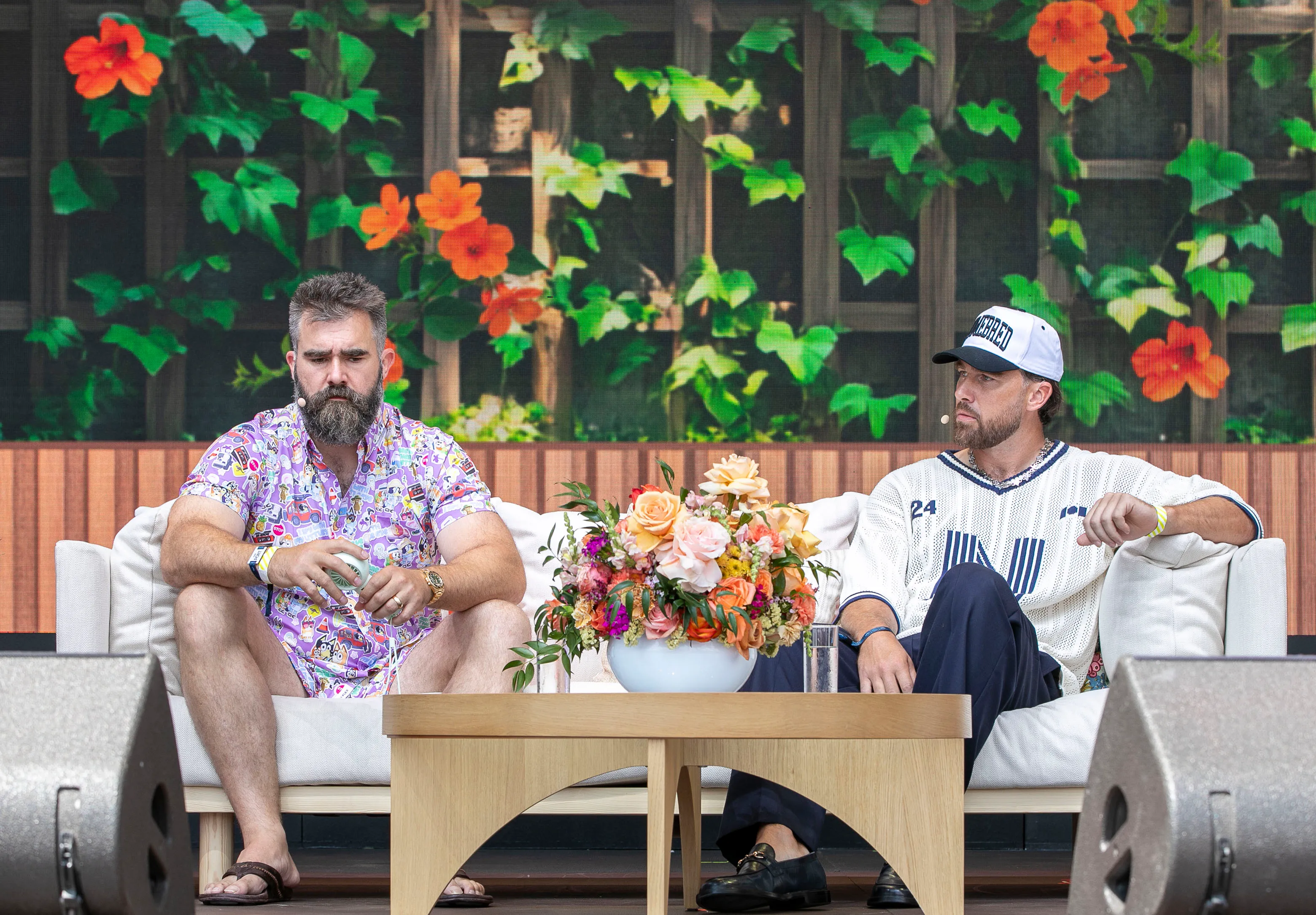 Jason and Travis Kelce sitting on a stage at Cannes Lions 2025.
