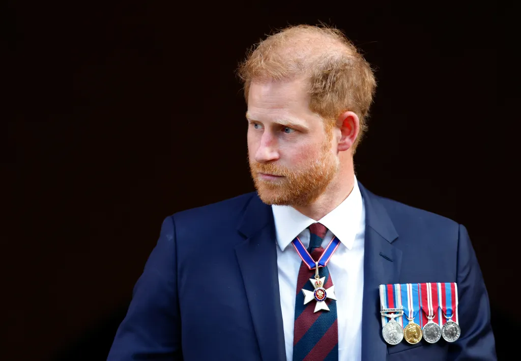 Prince Harry, Duke of Sussex, wearing a regimental tie and medals.