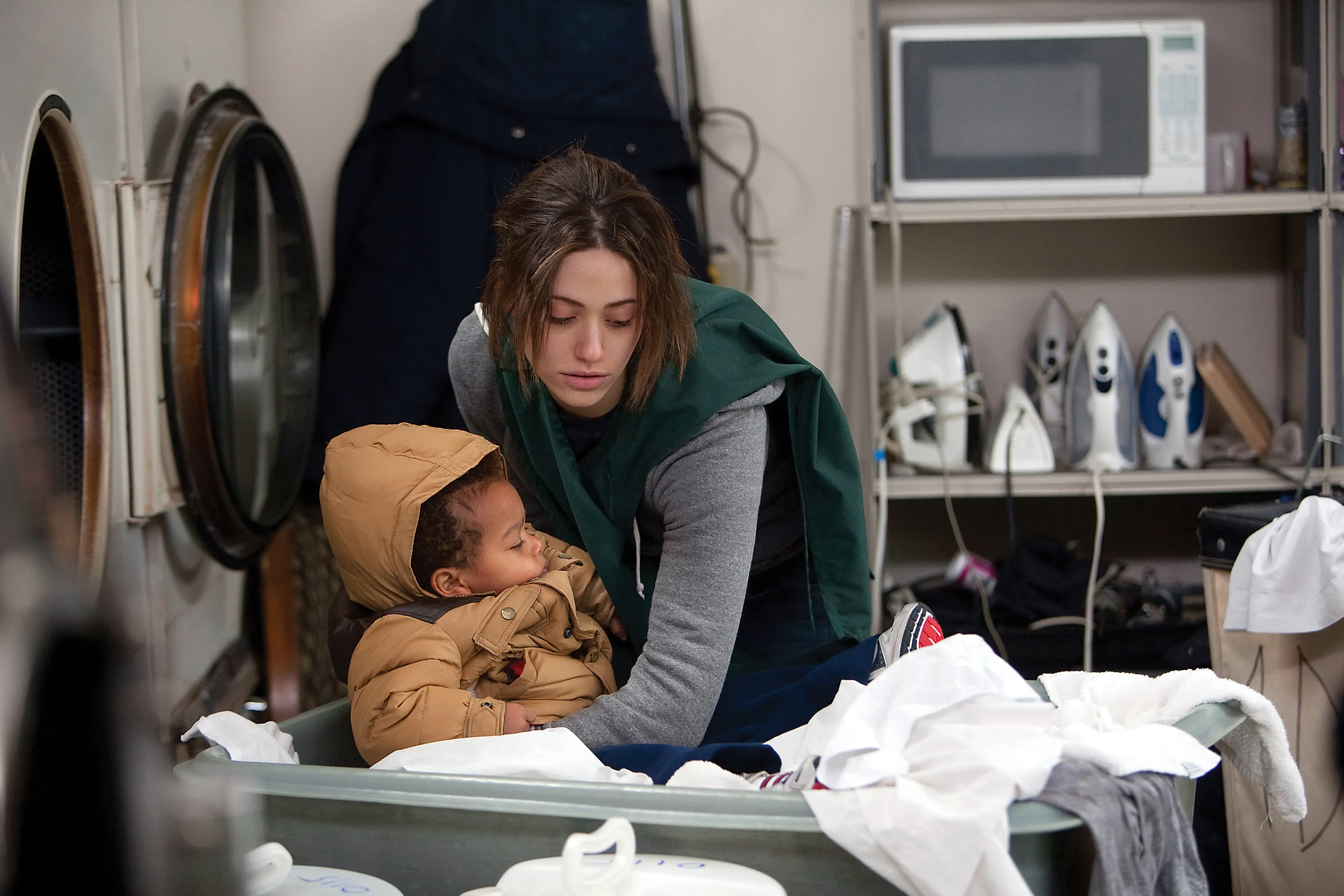 Emmy Rossum as Fiona Gallagher with Blake/Brennan Johnson as Liam in Shameless.