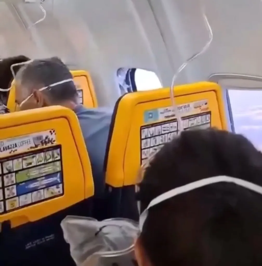 Cabin window shattered by engine debris during a Ryanair flight.