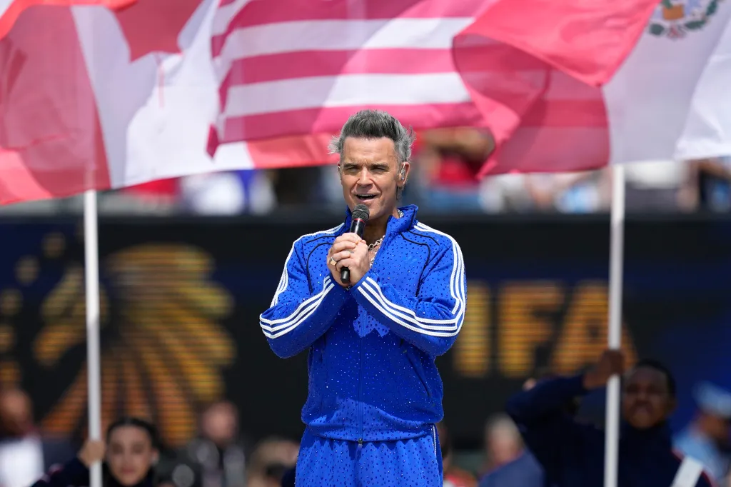 English singer Robbie Williams performing during the tournament closing ceremony before the World Cup final soccer match.