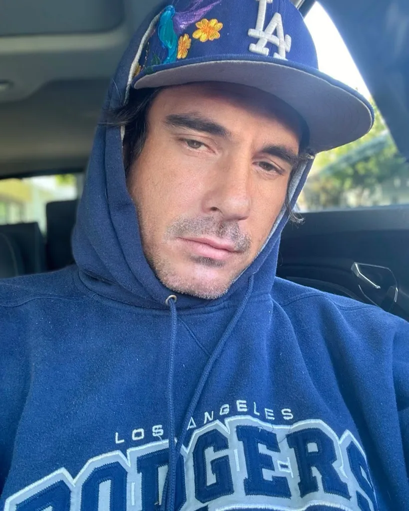 Ethan Browne wearing a blue Los Angeles Dodgers hoodie and hat.