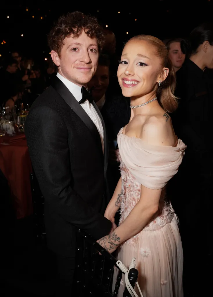 Ethan Slater and Ariana Grande smiling at the 31st Screen Actors Guild Awards.