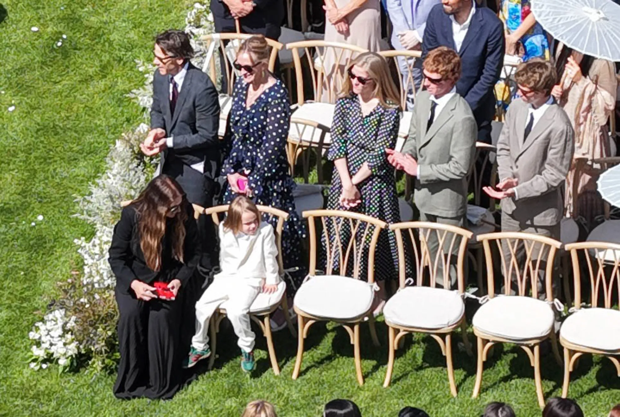 Julia Roberts and Daniel Moder attending a wedding with their family members.