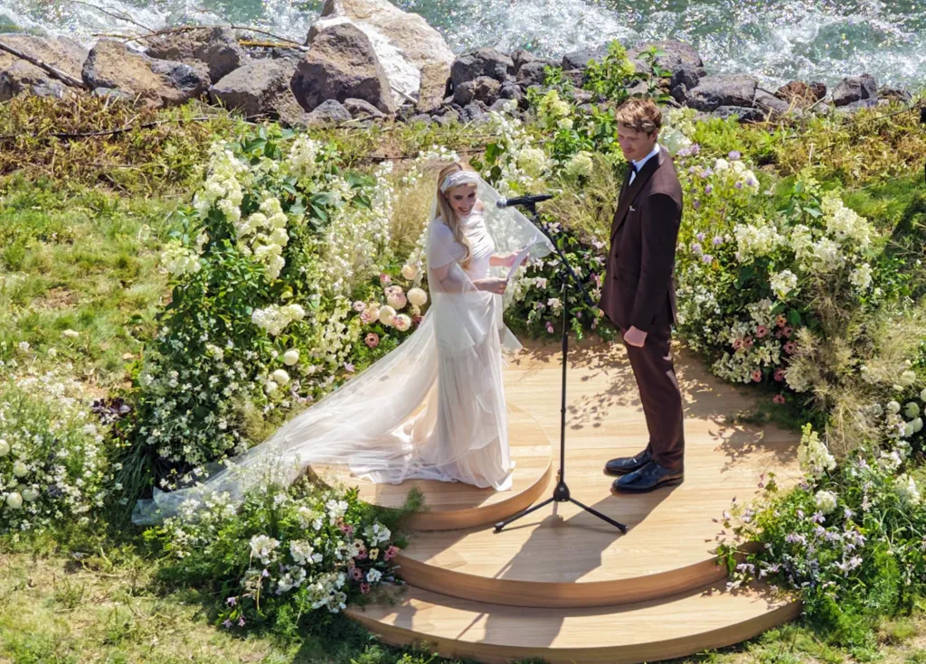 Emma Roberts and Cody John at their outdoor wedding ceremony.