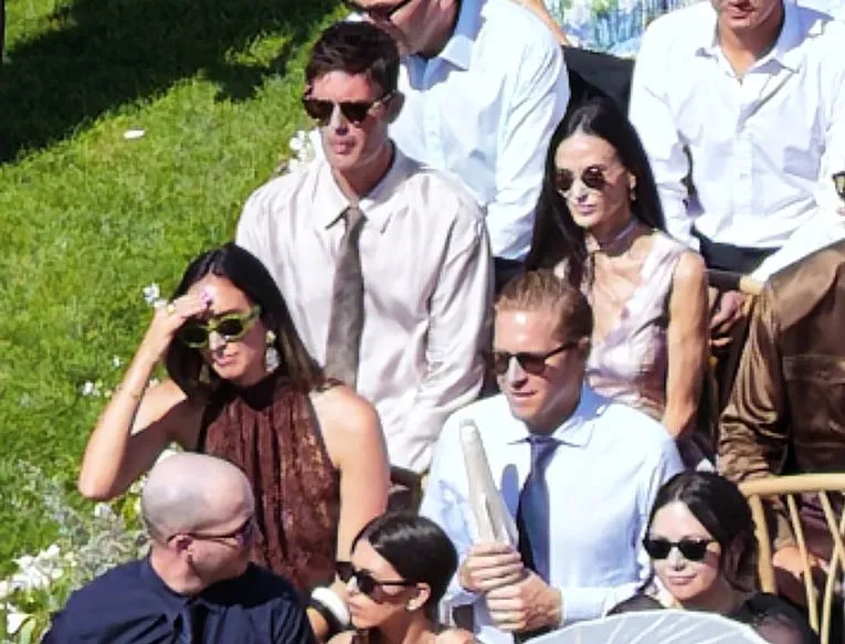 Demi Moore, Sarah Paulson, Billie Lourd, Ashley Benson, and Brandon Davis among guests at Emma Roberts' wedding.
