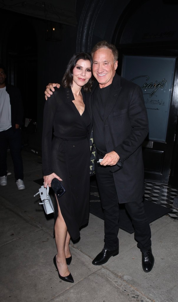 Heather and Terry Dubrow smiling outside Craig's Restaurant.