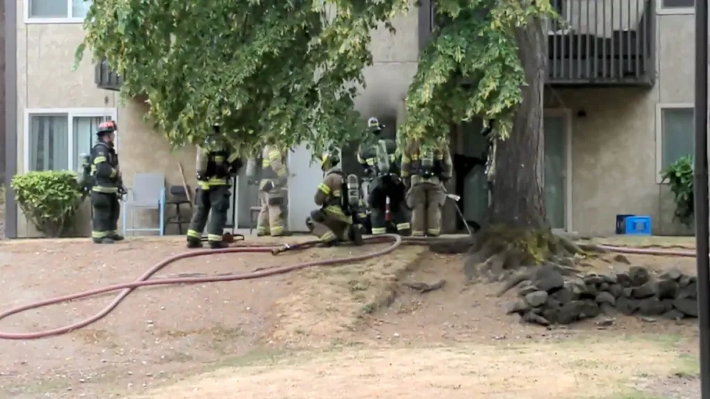 Firefighters could be seen checking on one another and moving away from the damaged building.