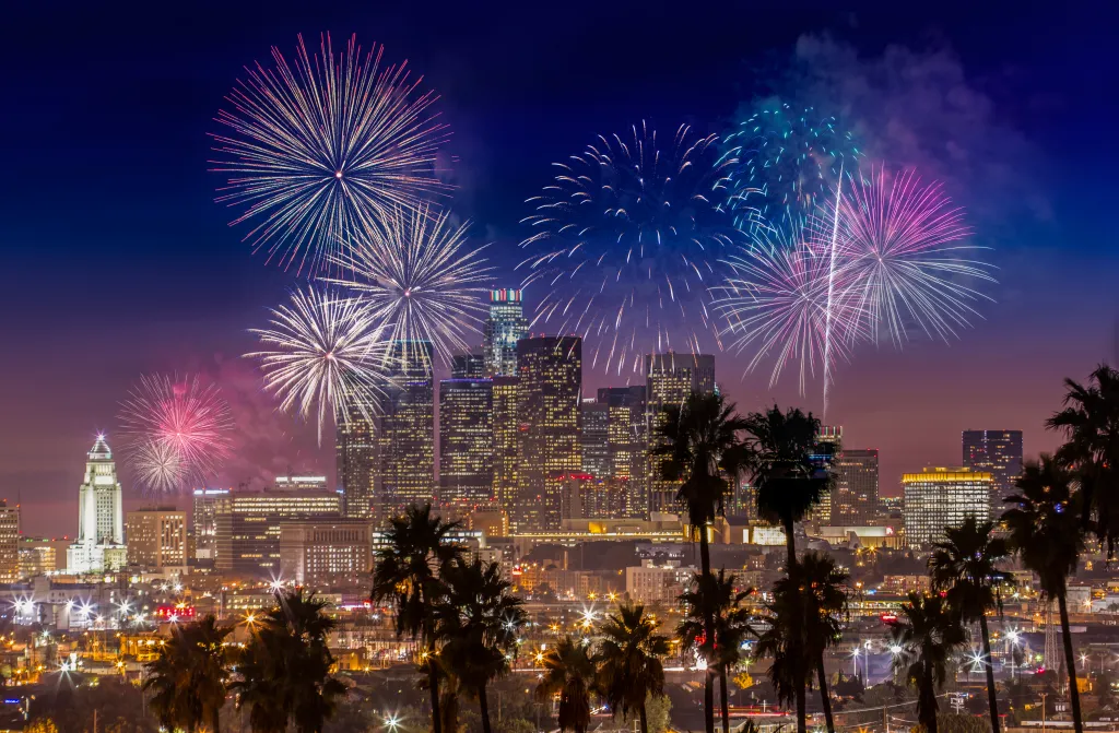 Fireworks burst over the skyline of Downtown Los Angeles.