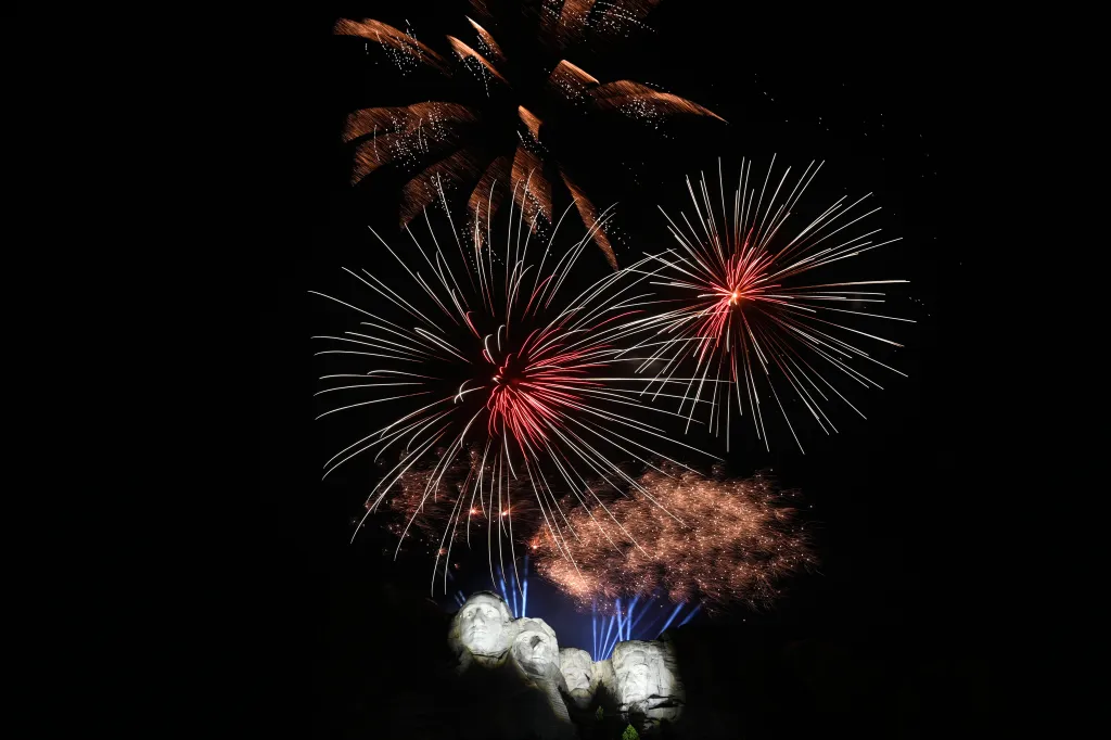 Fireworks explode behind Mount Rushmore during a Fourth of July event on July 3, 2026.