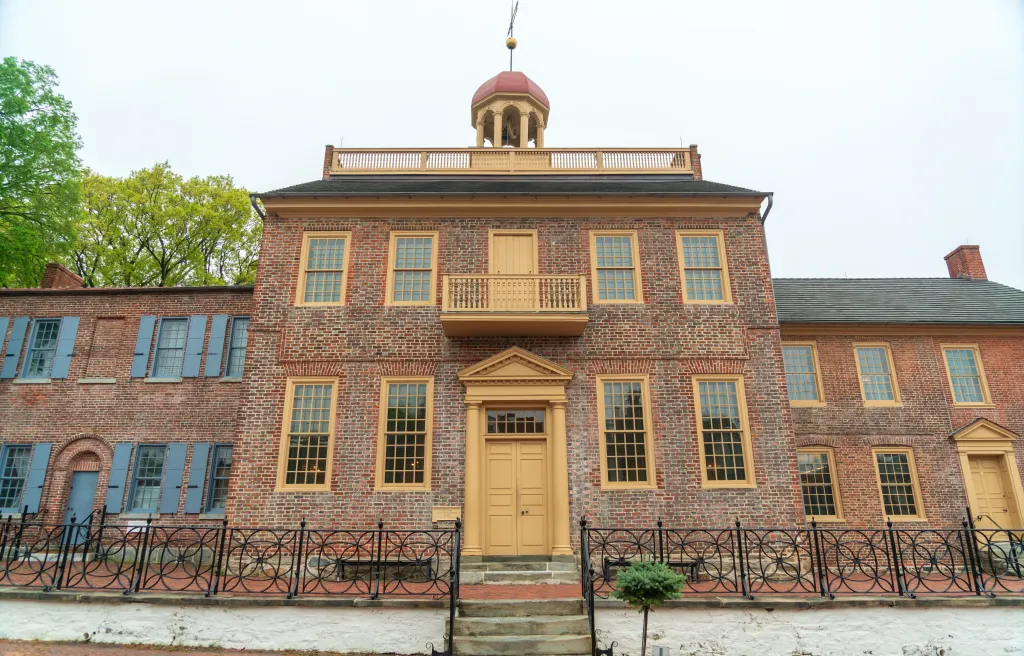The New Castle Court House Museum, a brick building with a cupola, part of the First State National Historical Park.