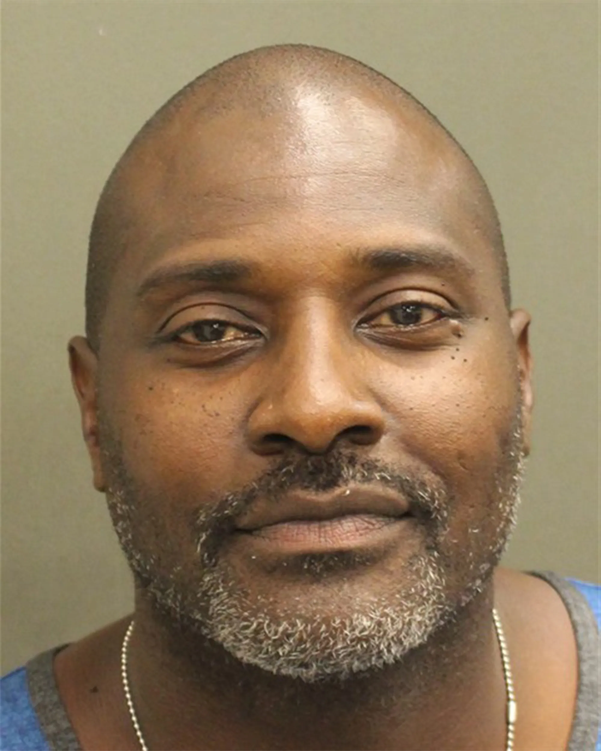 Mugshot of Marcellus Wiley, an African American man with a bald head and a graying beard, looking directly at the camera.