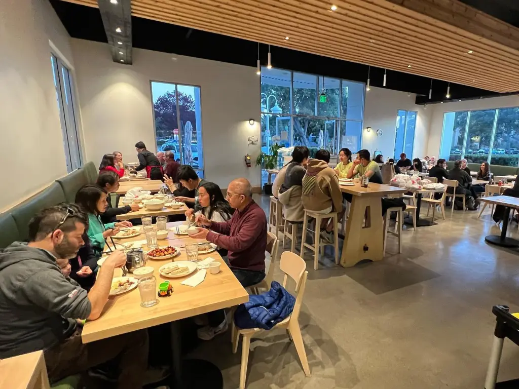 People dining inside Chez Xue restaurant.