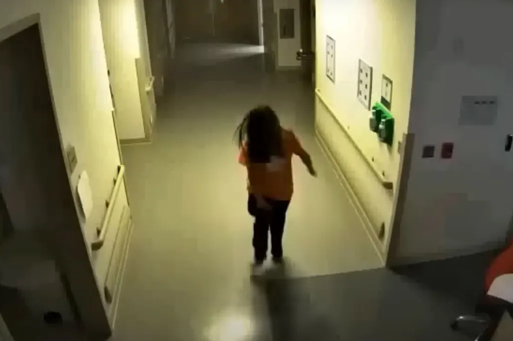 CCTV footage of Alexee Trevizo walking down a hospital hallway.