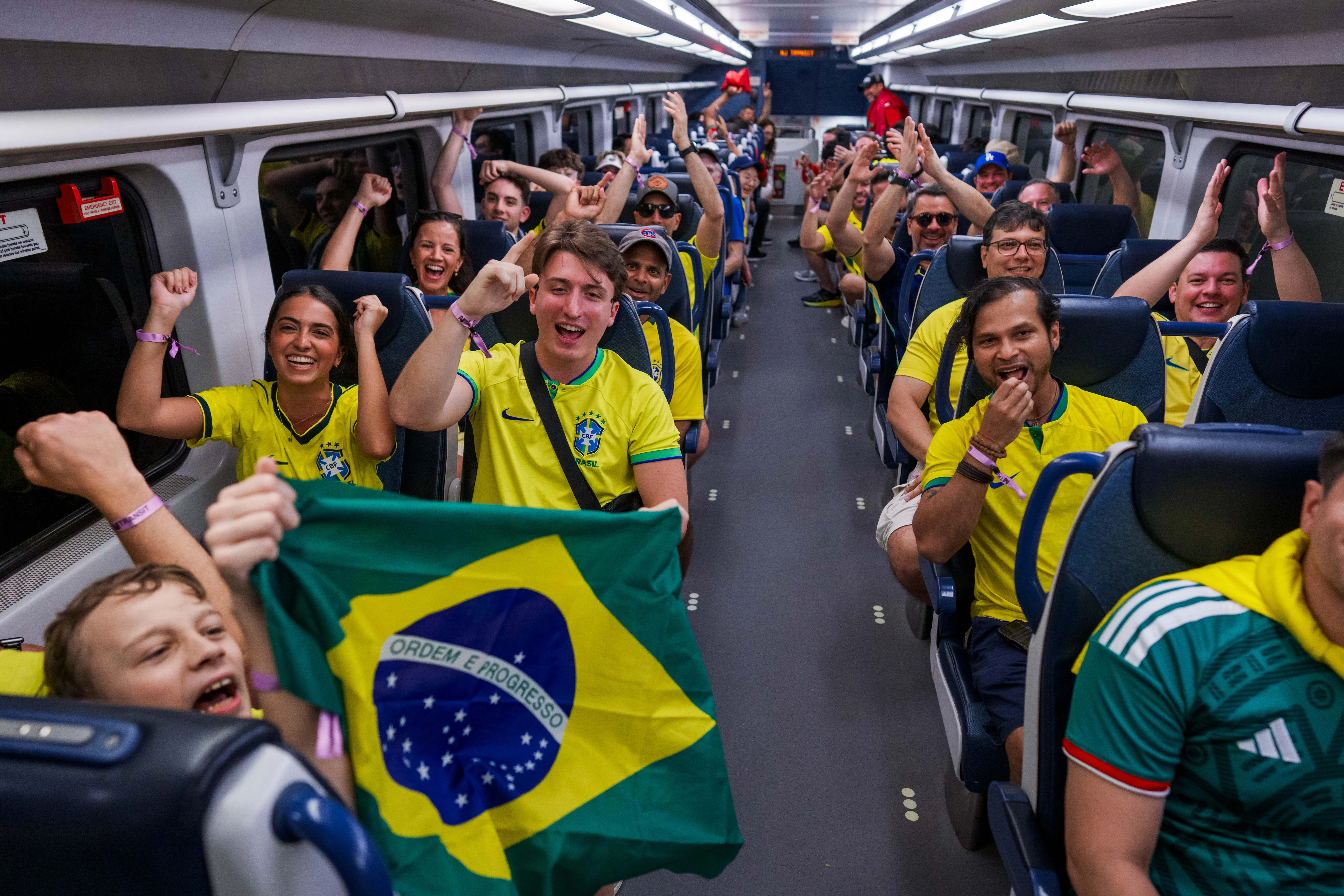 Brazil fans ride to a World Cup match on NJ transit
