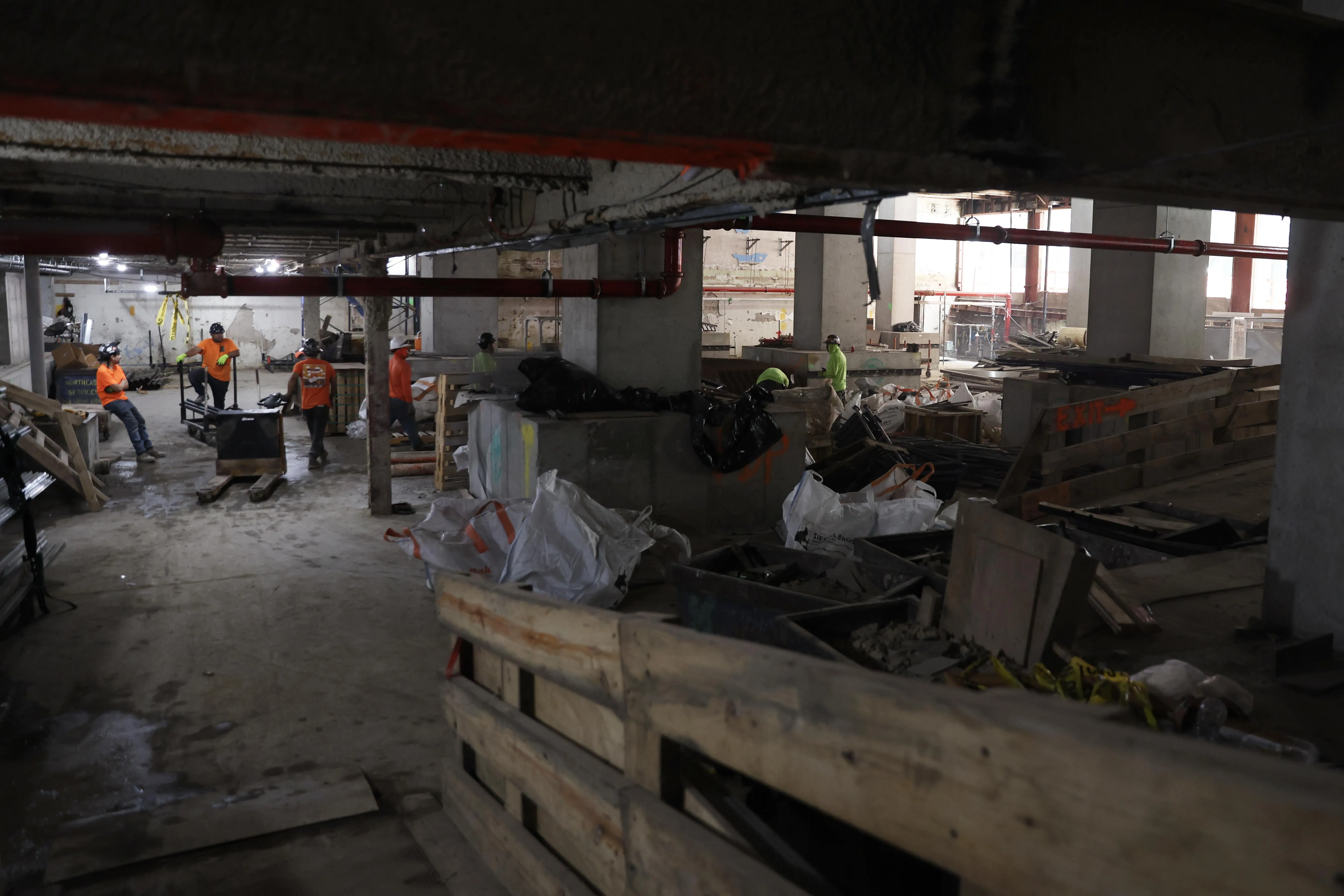 Workers in the former Pfizer Inc. headquarters during an office conversion to rental apartments in New York, US, on Wednesday, Aug. 13, 2025. Photographer: Heather Khalifa/Bloomberg via Getty Images