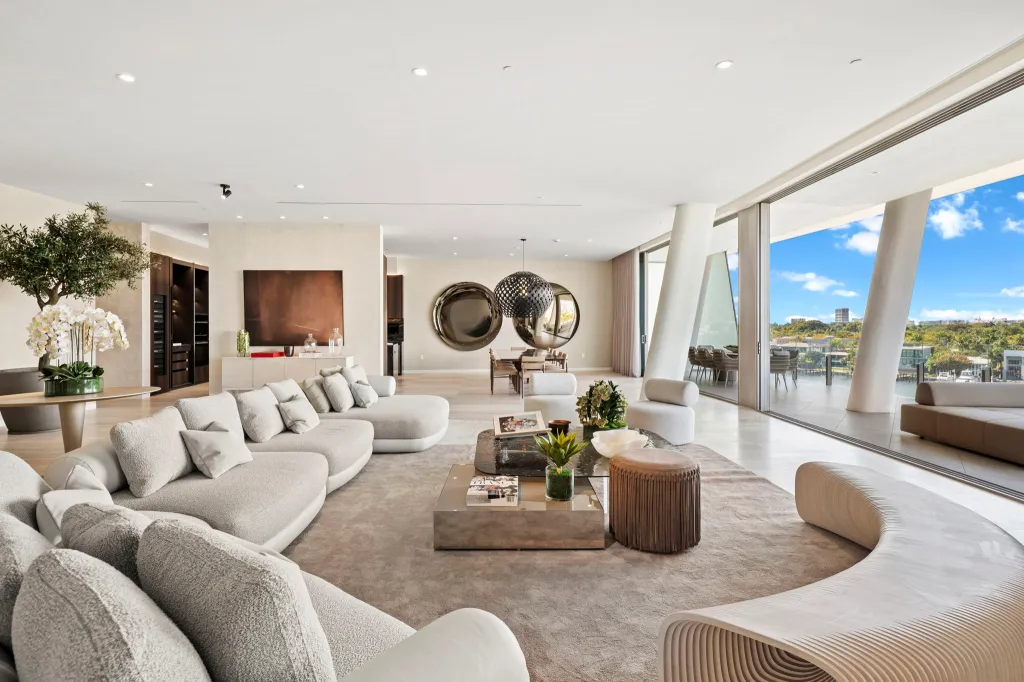 A cozy seating area leads to the outdoor space
