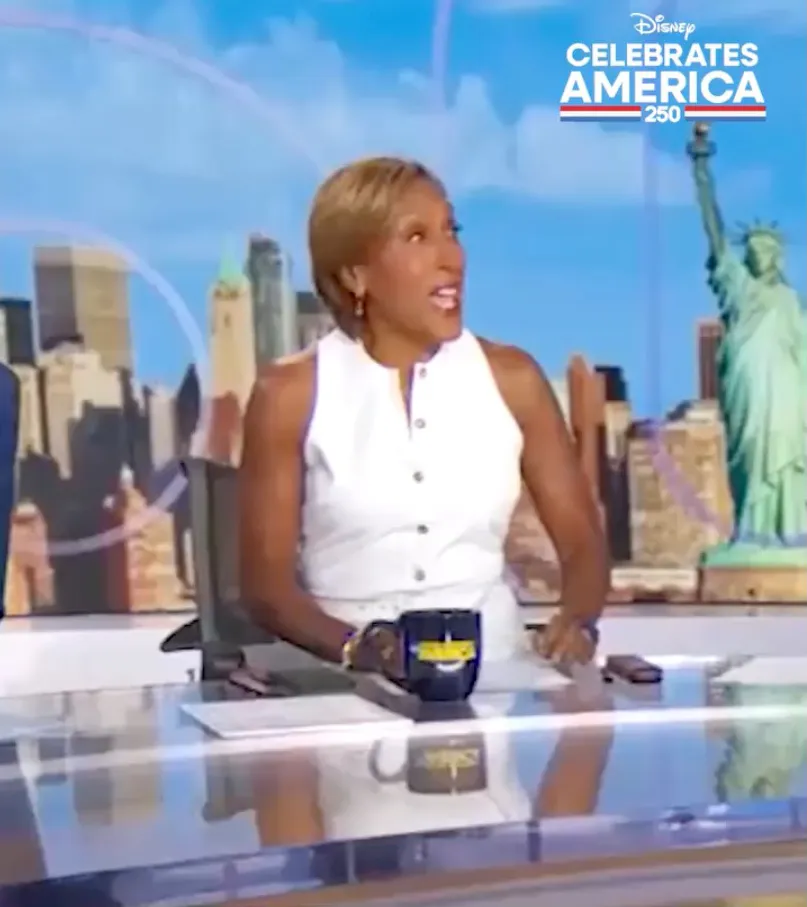 GMA co-host Robin Roberts on set with the Disney Celebrates America 250 logo in the background.